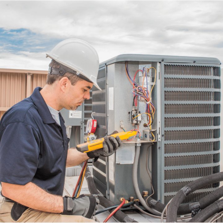 Ridgetown Duct Cleaning certified duct cleaning technician on a service call in Ridgetown, Ontario
